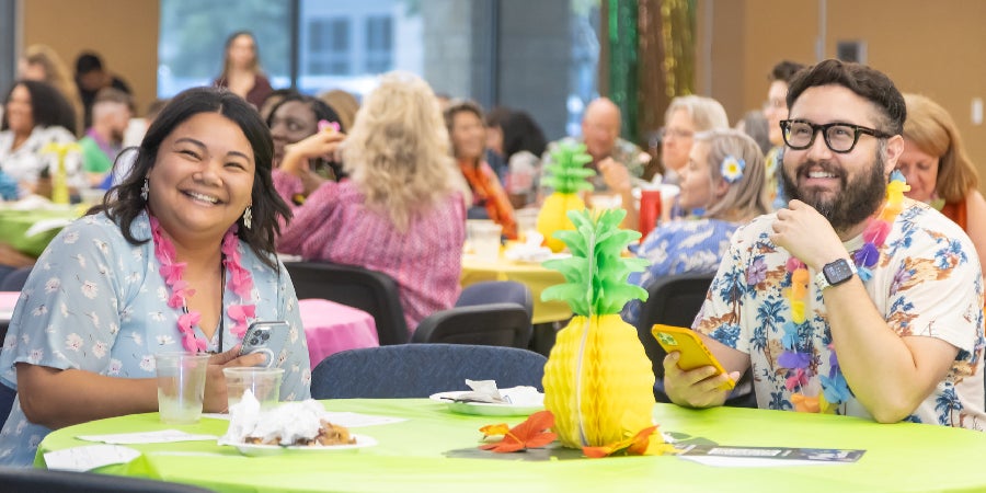 TASB Employees smiling at year-end party